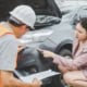 male insurance officer came to help inspect a customer's car that had an accident. Concept for vehicle crash, insurance claim.