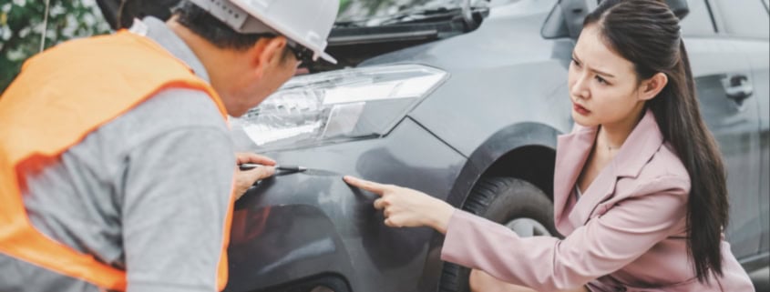 male insurance officer came to help inspect a customer's car that had an accident. Concept for vehicle crash, insurance claim.